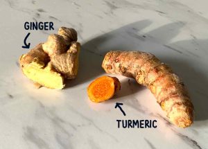 comparing turmeric and ginger cut up pieces