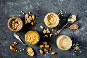 seed nut butter on rustic black background