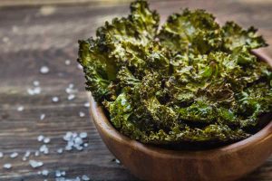 sea salt and oil in bowl with kale